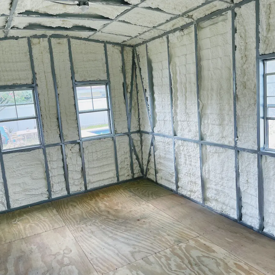 Closed-cell spray foam insulation applied to wall cavities in a residential project in Odenville